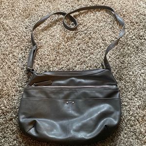 Crossbody bag, with plenty of pockets.